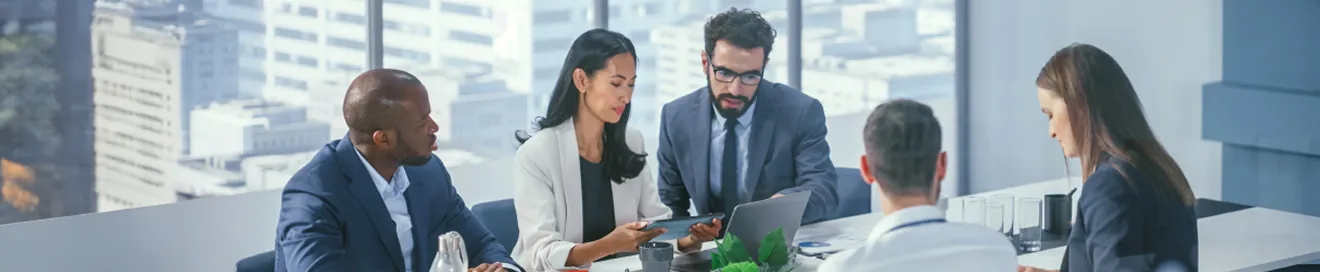 Who needs bookkeeping services Business professionals in a meeting discussing bookkeeping and finance